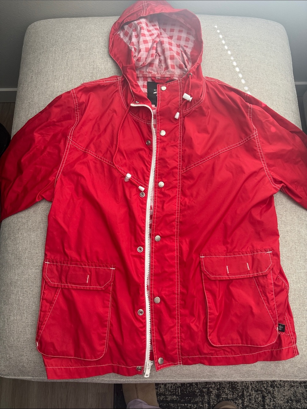 Stussy Red Hooded Raincoat with Check-Lined Hood
